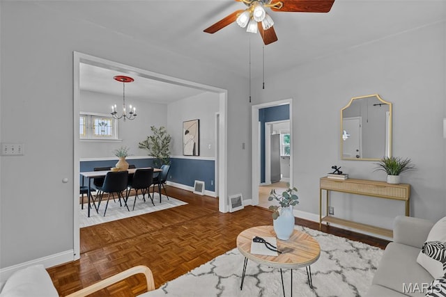 5524 Devonshire Ave, Saint Louis, MO 63109 - living area featuring a ceiling fan and a chandelier