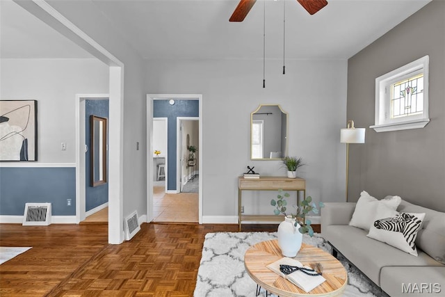 5524 Devonshire Ave, Saint Louis, MO 63109 - living room featuring ceiling fan and baseboards