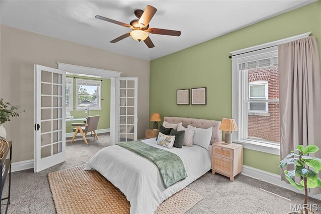 5524 Devonshire Ave, Saint Louis, MO 63109 - carpeted bedroom with french doors and a ceiling fan