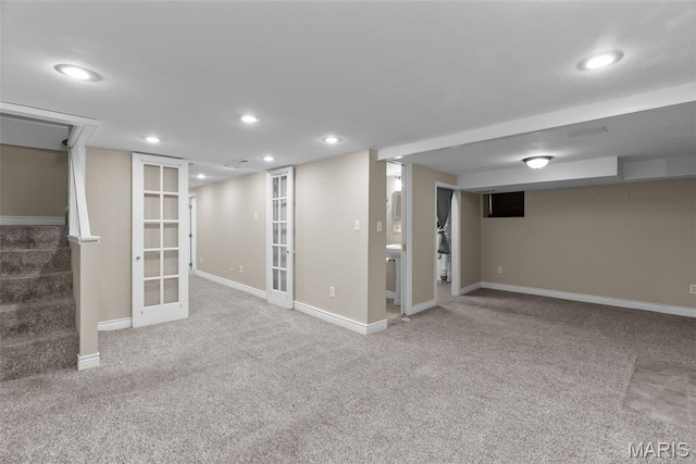 5524 Devonshire Ave, Saint Louis, MO 63109 - finished below grade area with french doors, stairs, carpet floors, and recessed lighting