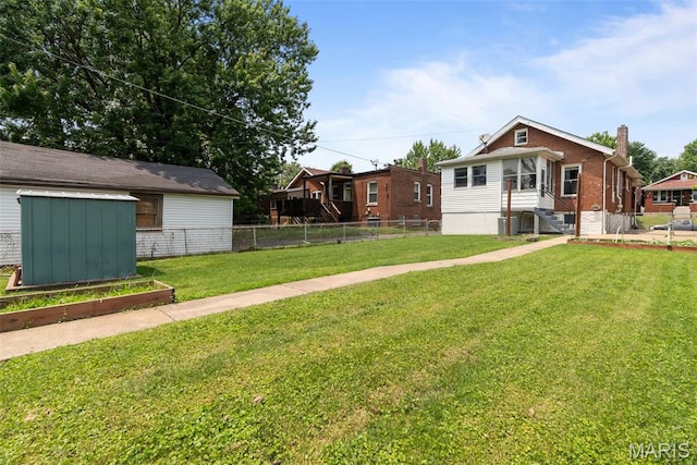 5524 Devonshire Ave, Saint Louis, MO 63109 - view of yard with a storage shed and a garden