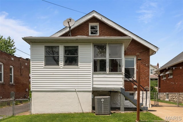 5524 Devonshire Ave, Saint Louis, MO 63109 - view of property exterior with a central AC unit and a gate