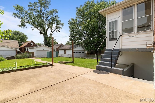 5524 Devonshire Ave, Saint Louis, MO 63109 - view of patio / terrace featuring a detached garage