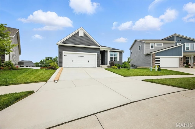 213 Dell View Dr, Arnold, MO 63010 - view of front of home featuring a front yard, driveway, and an attached garage