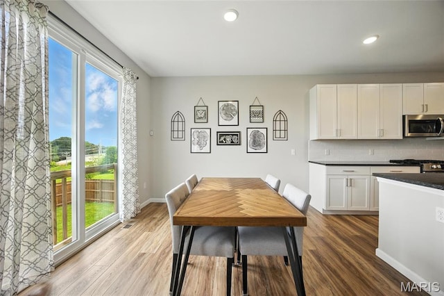 213 Dell View Dr, Arnold, MO 63010 - dining room with wood finished floors and recessed lighting
