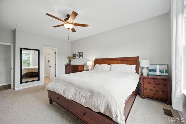 213 Dell View Dr, Arnold, MO 63010 - bedroom with light carpet, a ceiling fan, and ensuite bath