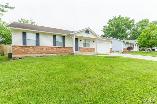 1655 Oakwood Dr, Ofallon, MO 63366 - single story home with driveway, brick siding, and a garage