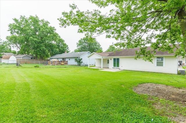 1655 Oakwood Dr, Ofallon, MO 63366 - back of house with a patio area