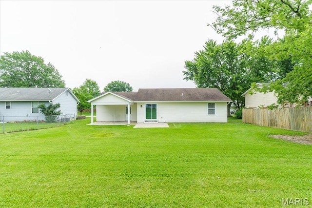 1655 Oakwood Dr, Ofallon, MO 63366 - rear view of house with a patio area