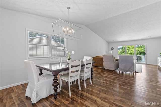 1531 Charmaine Dr, Bonne Terre, MO 63628 - dining area featuring a chandelier, a textured ceiling, wood finished floors, and vaulted ceiling