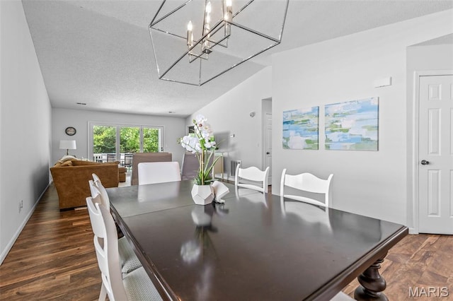 1531 Charmaine Dr, Bonne Terre, MO 63628 - dining room with wood finished floors, a textured ceiling, and a chandelier