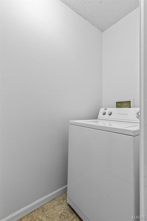 1531 Charmaine Dr, Bonne Terre, MO 63628 - laundry room with washer / clothes dryer and a textured ceiling