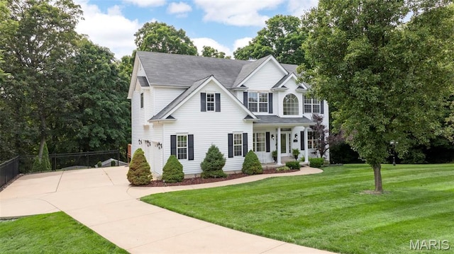 5 Hickory Glen Ct, Lake St Louis, MO 63367 - traditional home with concrete driveway and covered porch