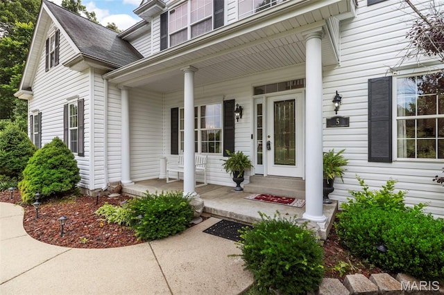 5 Hickory Glen Ct, Lake St Louis, MO 63367 - property entrance featuring a porch