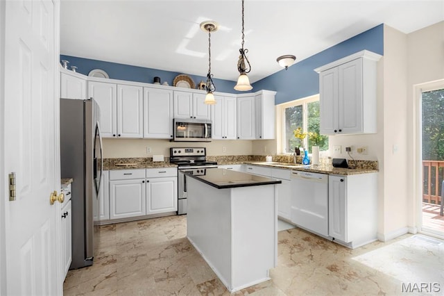 5 Hickory Glen Ct, Lake St Louis, MO 63367 - kitchen featuring stainless steel appliances, white cabinetry, and light marble finish flooring