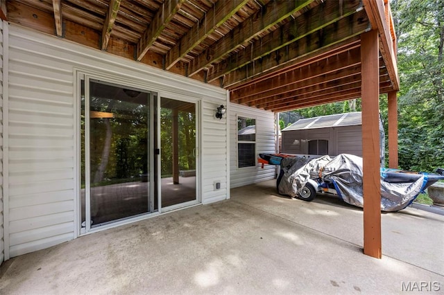 5 Hickory Glen Ct, Lake St Louis, MO 63367 - view of patio / terrace featuring a storage unit