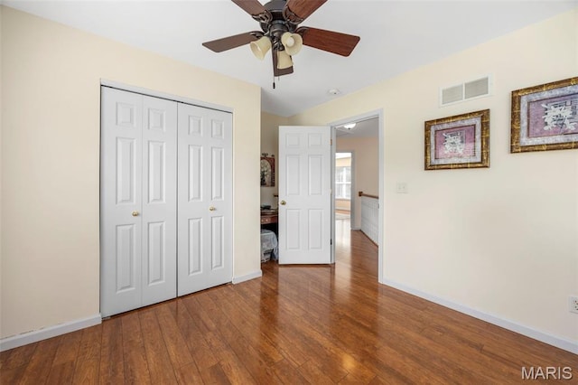 5 Hickory Glen Ct, Lake St Louis, MO 63367 - unfurnished bedroom with a closet, wood-type flooring, and a ceiling fan