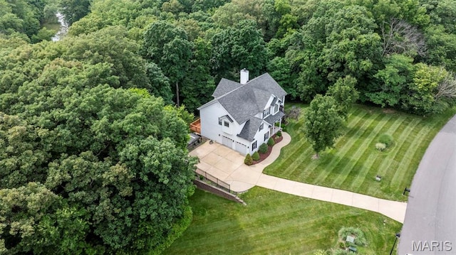 5 Hickory Glen Ct, Lake St Louis, MO 63367 - aerial view of property and surrounding area featuring a heavily wooded area