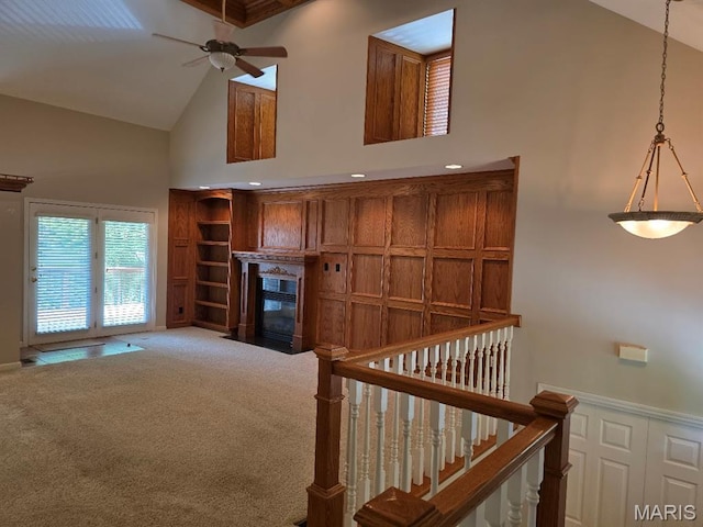 302 Lorean St, Troy, IL 62294 - corridor with high vaulted ceiling, carpet floors, and wainscoting