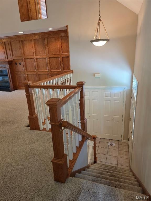 302 Lorean St, Troy, IL 62294 - stairs with carpet flooring and high vaulted ceiling