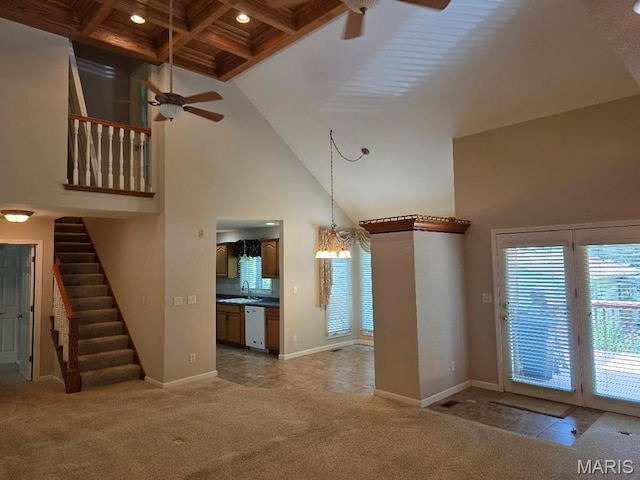 302 Lorean St, Troy, IL 62294 - unfurnished living room with a ceiling fan, carpet floors, a towering ceiling, stairway, and beam ceiling