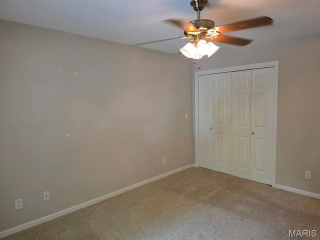 302 Lorean St, Troy, IL 62294 - unfurnished bedroom with carpet floors, a closet, and ceiling fan