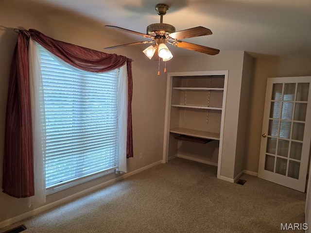302 Lorean St, Troy, IL 62294 - unfurnished bedroom featuring carpet, a ceiling fan, and a closet