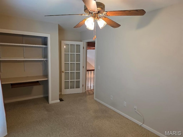 302 Lorean St, Troy, IL 62294 - unfurnished bedroom featuring carpet floors, a ceiling fan, and a closet
