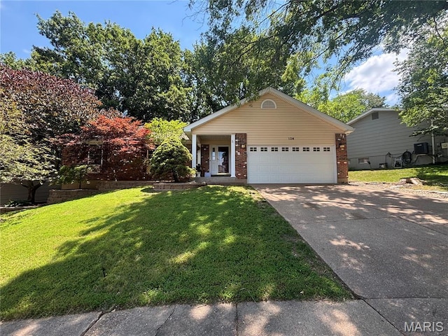 126 Asilomar Ct, Ballwin, MO 63021 - view of front facade with driveway, brick siding, a front lawn, and an attached garage