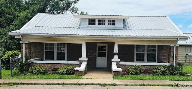 602 High, Fredericktown, MO 63645 - view of front of house featuring a porch and a metal roof