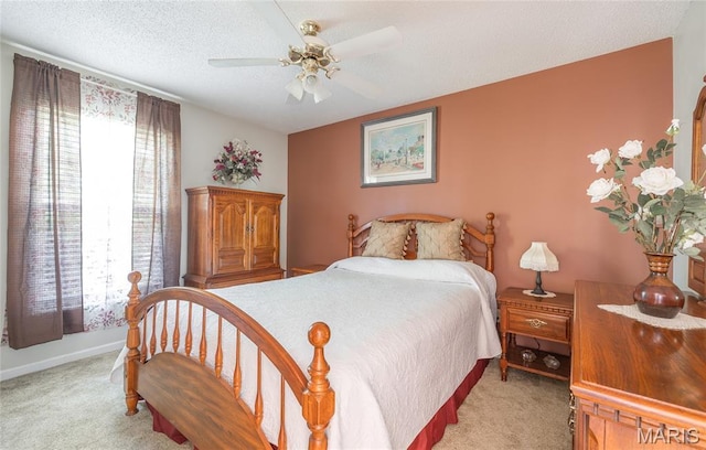 240 N Bernhardt Ave, Gerald, MO 63037 - bedroom featuring light carpet, a ceiling fan, and a textured ceiling