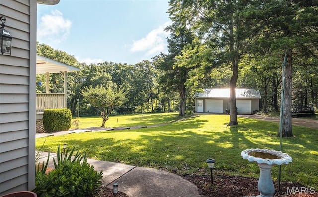 240 N Bernhardt Ave, Gerald, MO 63037 - view of green lawn with a detached garage and an outdoor structure
