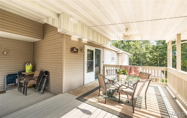 240 N Bernhardt Ave, Gerald, MO 63037 - wooden deck featuring a ceiling fan and outdoor dining area