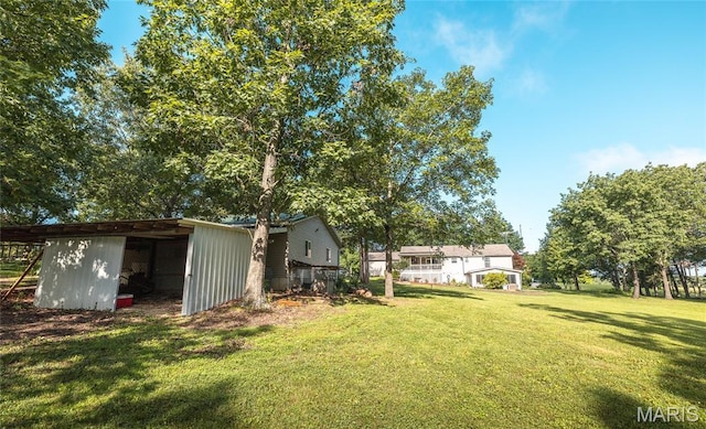 240 N Bernhardt Ave, Gerald, MO 63037 - view of grassy yard with an outbuilding and an outdoor structure