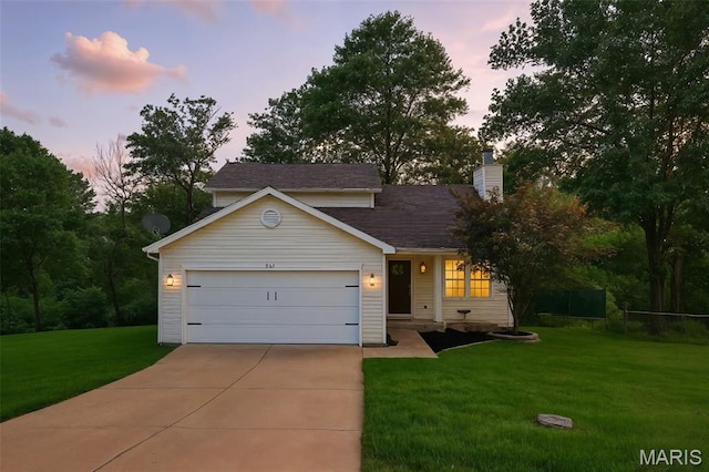 794 Buckboard Ln, Fenton, MO 63026 - view of front facade with driveway, a garage, and a chimney