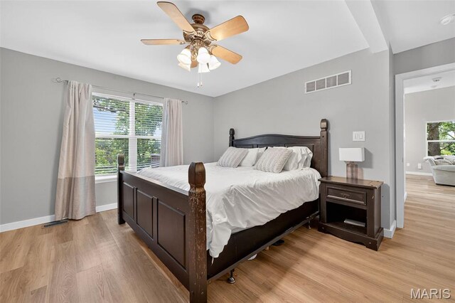 794 Buckboard Ln, Fenton, MO 63026 - bedroom featuring light wood-style flooring and a ceiling fan