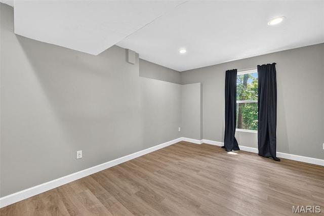 794 Buckboard Ln, Fenton, MO 63026 - spare room featuring wood finished floors and recessed lighting