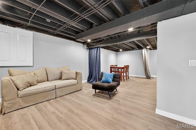 794 Buckboard Ln, Fenton, MO 63026 - living area with baseboards and light wood-style flooring