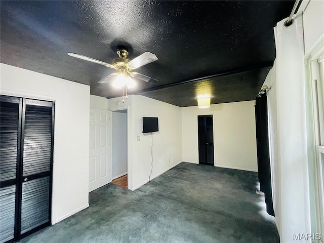 628 Valley View Dr, Bethalto, IL 62010 - unfurnished bedroom featuring carpet, a closet, and a ceiling fan