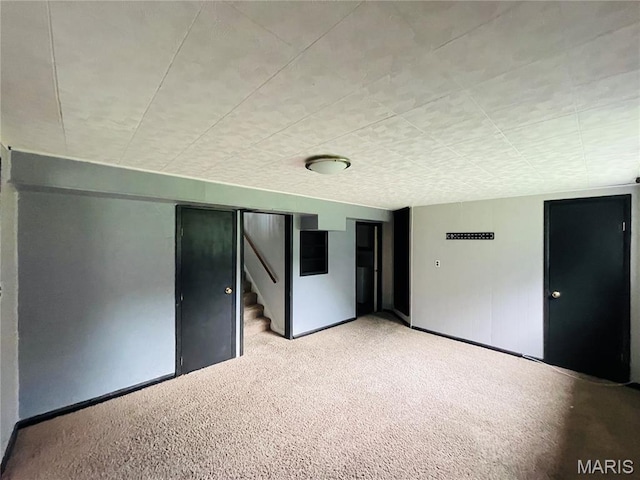 628 Valley View Dr, Bethalto, IL 62010 - spare room featuring carpet flooring and stairs