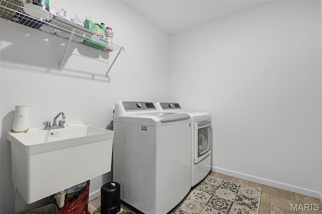 1007 Crows Nest Ct, Caseyville, IL 62232 - washroom with washer and dryer and baseboards