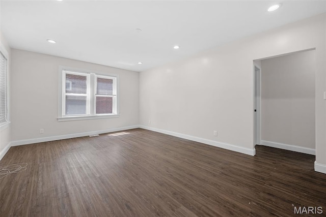 8260 Glen Echo Dr, Bel-Nor, MO 63121 - spare room with dark wood-style floors and recessed lighting
