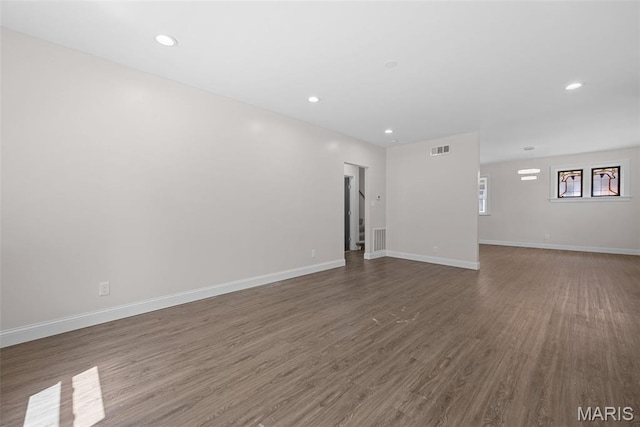 8260 Glen Echo Dr, Bel-Nor, MO 63121 - unfurnished room featuring wood finished floors and recessed lighting