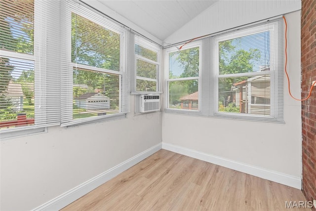8260 Glen Echo Dr, Bel-Nor, MO 63121 - unfurnished sunroom featuring vaulted ceiling and wood finished floors