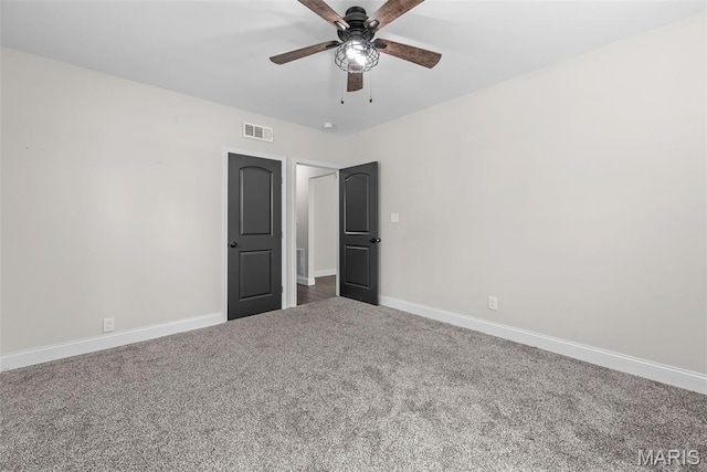 8260 Glen Echo Dr, Bel-Nor, MO 63121 - unfurnished bedroom featuring carpet flooring and ceiling fan