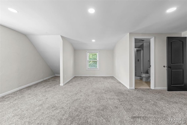 8260 Glen Echo Dr, Bel-Nor, MO 63121 - additional living space with carpet flooring, recessed lighting, and lofted ceiling