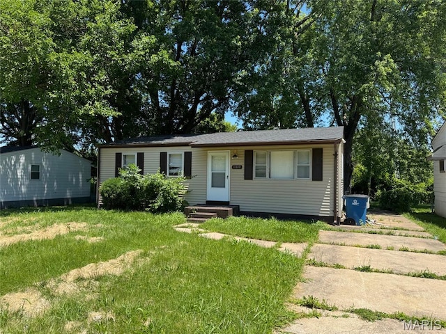 11880 Criterion Ave, Saint Louis, MO 63138 - view of front of home featuring a front yard