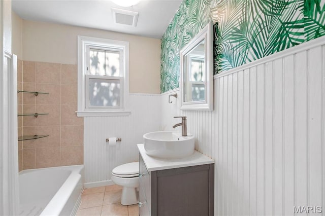6915 Wise Ave, Saint Louis, MO 63139 - bathroom featuring vanity, tile patterned flooring, wainscoting, and wallpapered walls