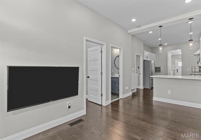 4355 Hunt Ave, Saint Louis, MO 63110 - unfurnished living room featuring dark wood-style flooring and recessed lighting