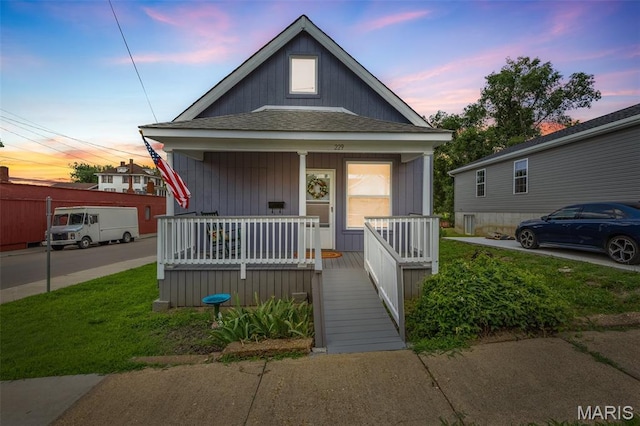 229 Broadway Ave, Crystal City, MO 63019 - view of front of house featuring a porch and roof with shingles